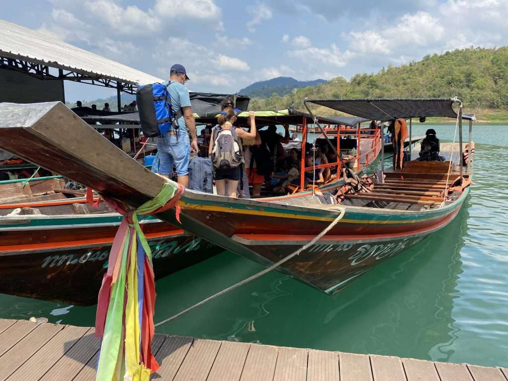 Khao Sok Lake tour Boarding the long boat to take us to the floating bungalows